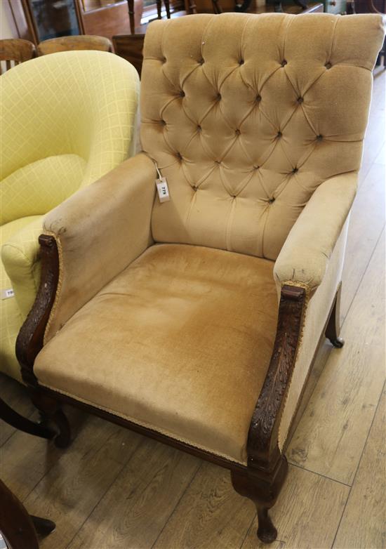 A French walnut button back armchair